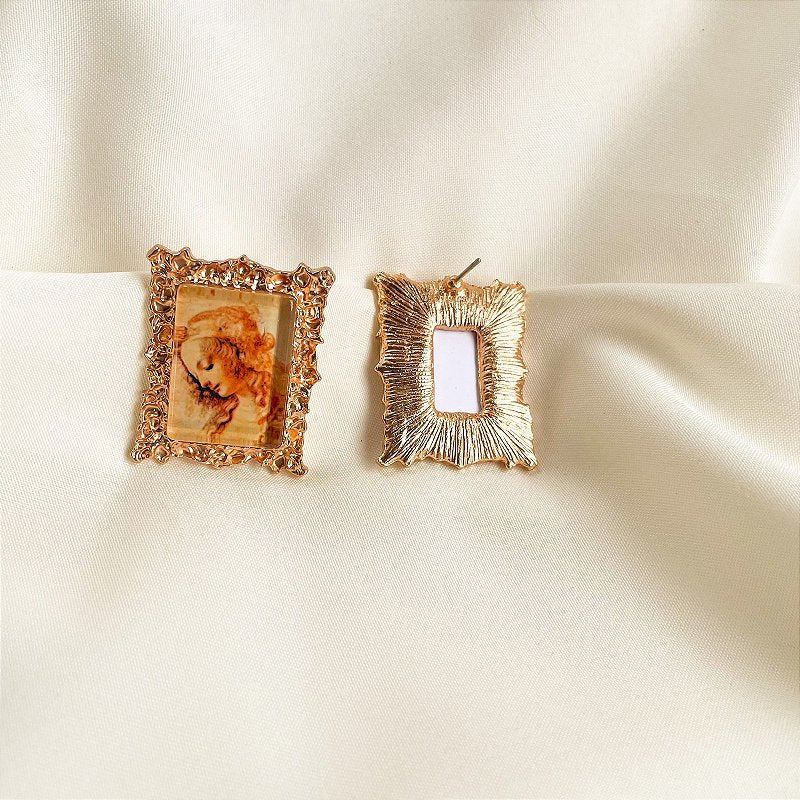 Brinco Cabeça de Mulher