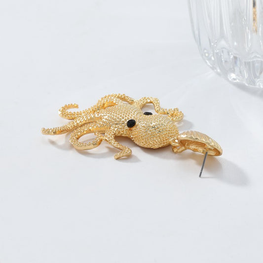 Brinco Polvo Dourado