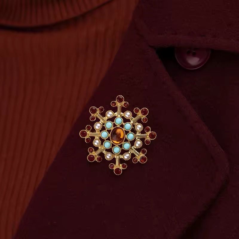 Broche Maya