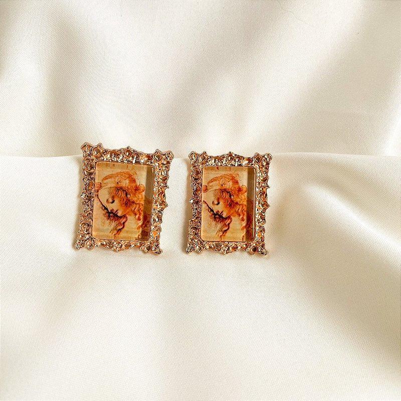 Brinco Cabeça de Mulher